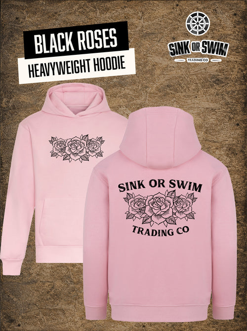 Pale pink Black Roses heavyweight hoodie flat lay, black tattoo-style roses on the chest and Sink Or Swim Trading Co roses back print